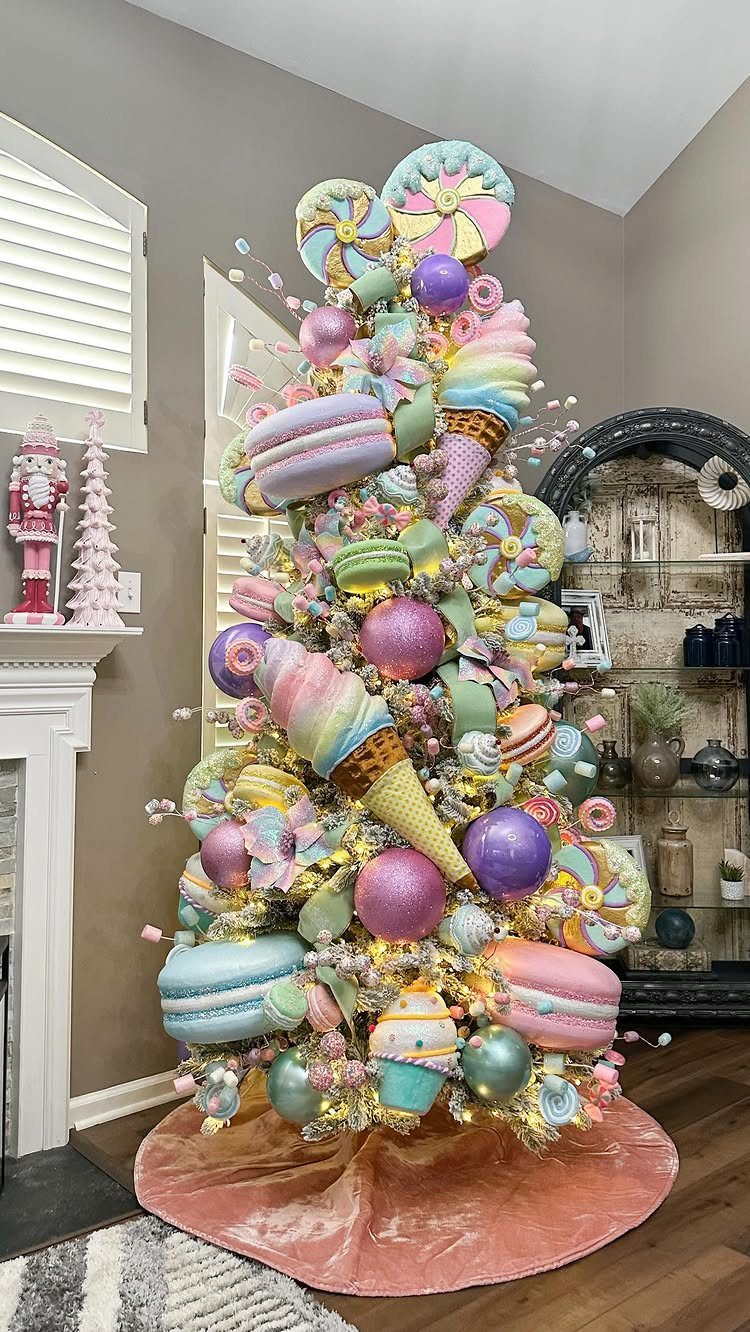 Christmas Tree Decor Ideas for 2025: 17 Fresh Styles from Coastal to Candyland 9 A pastel Christmas tree decorated with large macarons, ice cream cones, and colorful candy ornaments.