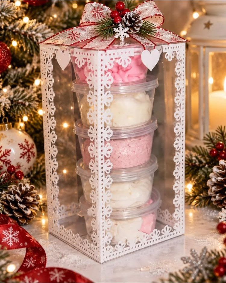 17 Easy DIY Christmas Gifts: Handmade Presents for Every List 13 Stacked containers of pink and white cream inside a decorative lace-edged gift box.