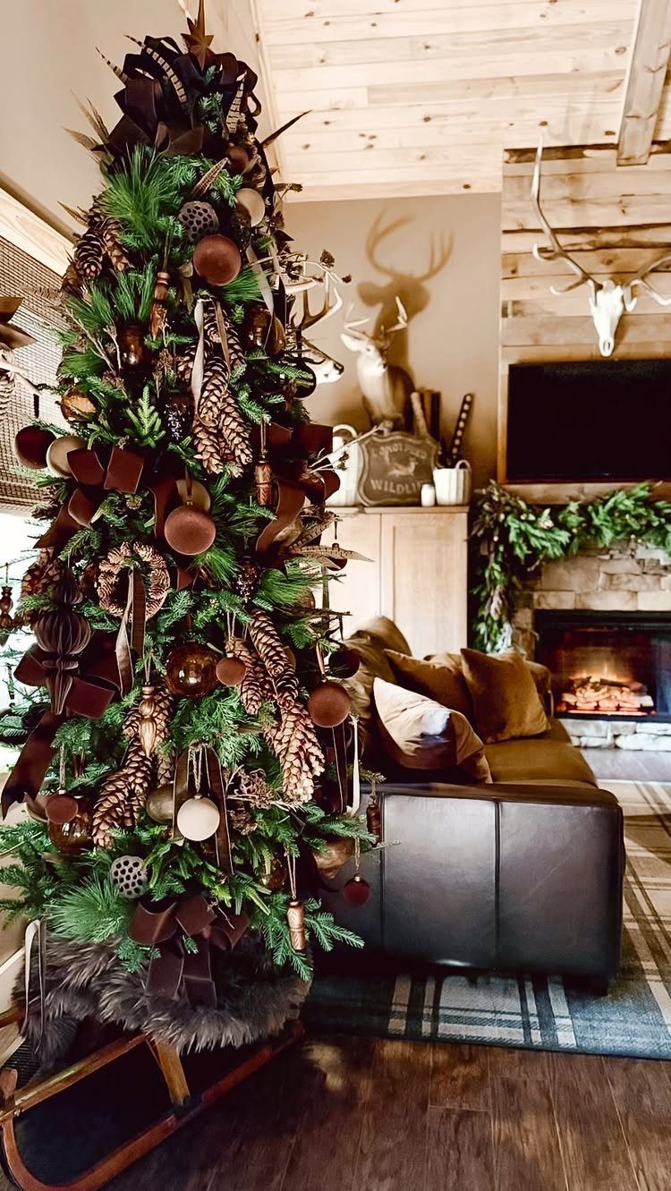 A rustic Christmas tree decorated with wooden ornaments and pinecones in a cozy living room.
